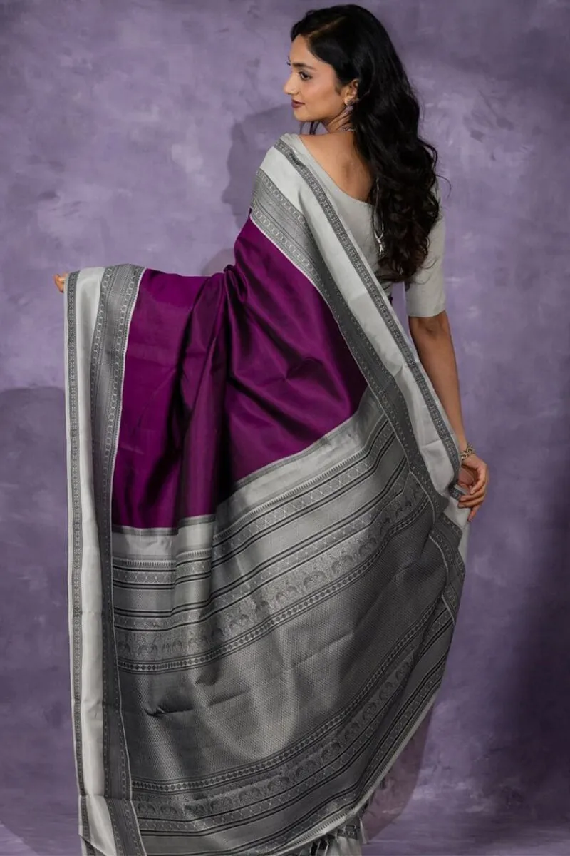 Cynosure Wine Soft Silk Saree With Scrupulous Blouse Piece